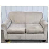 Beige Upholstered Love Seat