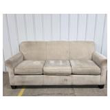 Beige Upholstered Couch