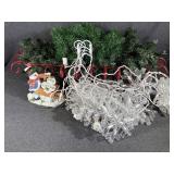 Green Pine Garland In A Red Metal Basket