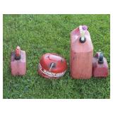 3 Plastic Gas Cans, 1 Metal Gas Can