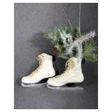 White Leather Ice Stakes With A Floral Arrangement