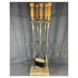 Gold Tone Fireplace Tools On A Stand