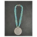 Turquoise beaded necklace Silvertone medallion