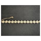 Goldtone Plumeria flower necklace