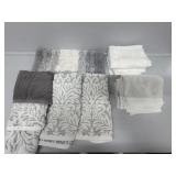 Small white and gray small rug, white hand towels
