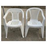2 White Plastic Chairs