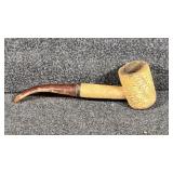 Corn cob pipe with amber colored stem (used)