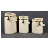 JC Penny Ceramic Canisters Brass Colored Metal