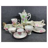 China teacups, Gravy Boat with saucer,