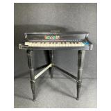 Vintage Peek a Babe kids organ (battery operated)