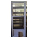 32 X 80  White Self Storing Storm Door