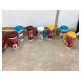 Box of 7 Disney cups 1 lid missing