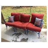 Retro metal outdoor seating with cushions and pillows