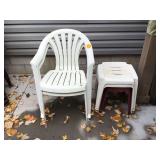 Two white plastic chairs and four outdoor end stands