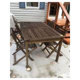 Outdoor dining set with table and chairs
