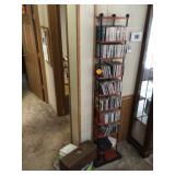 Extensive collection of country music CDs with rack