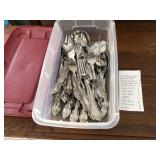Oneida flatware set in plastic shoebox