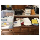 Set of kitchen linens in storage tote