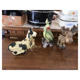 Damaged animal figurines moose cow parakeet