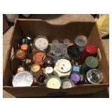 Assorted candles and holders