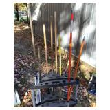 Storage for various lawn tools with handles