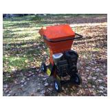 Gas-powered wood chipper with hitch operational