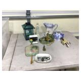 Asian inspired decor with ceramic pitchers in tote with lid