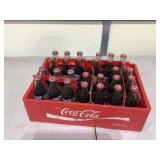 Five NASCAR Coca-Cola six-packs in tray (2 empty)
