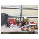 Assorted Coca-Cola collectibles in tote