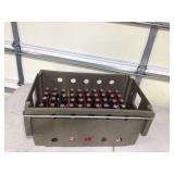 Variety of Coke bottles in tote