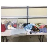 Fabric scraps and cutting mats in container