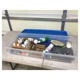 Craft supplies in container with lid