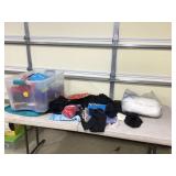 Various fabric pieces in tote with lid