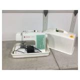 Singer sewing machine with case