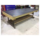 Large handmade shop table with wheels