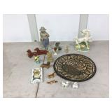 Assorted dog statues and other decorative items
