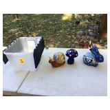 Ceramic figurines in tote