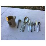Miscellaneous silverplate utensils in vintage stein