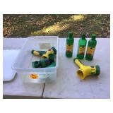 Liquid fertilizer and sprayers in tote with lid