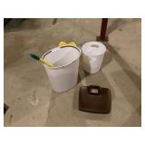 Three waste baskets and vintage scale