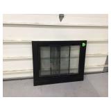 Metal screen with glass doors for fireplace