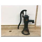 Vintage ornate functional cast iron pump
