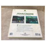Book showcasing John Deere farming equipment