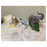 Tissue box with elephant figurines