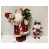 2 SANTA FIGURINES
