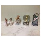 Delicate figurines and snowglobe décor