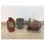 Old fire bucket flower bucket and cracked lantern