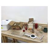 Various candles in basket