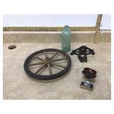 Vintage spy camera disguised as a bottle with wheel and cast iron piece