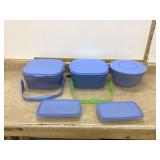 Various blue Tupperware containers